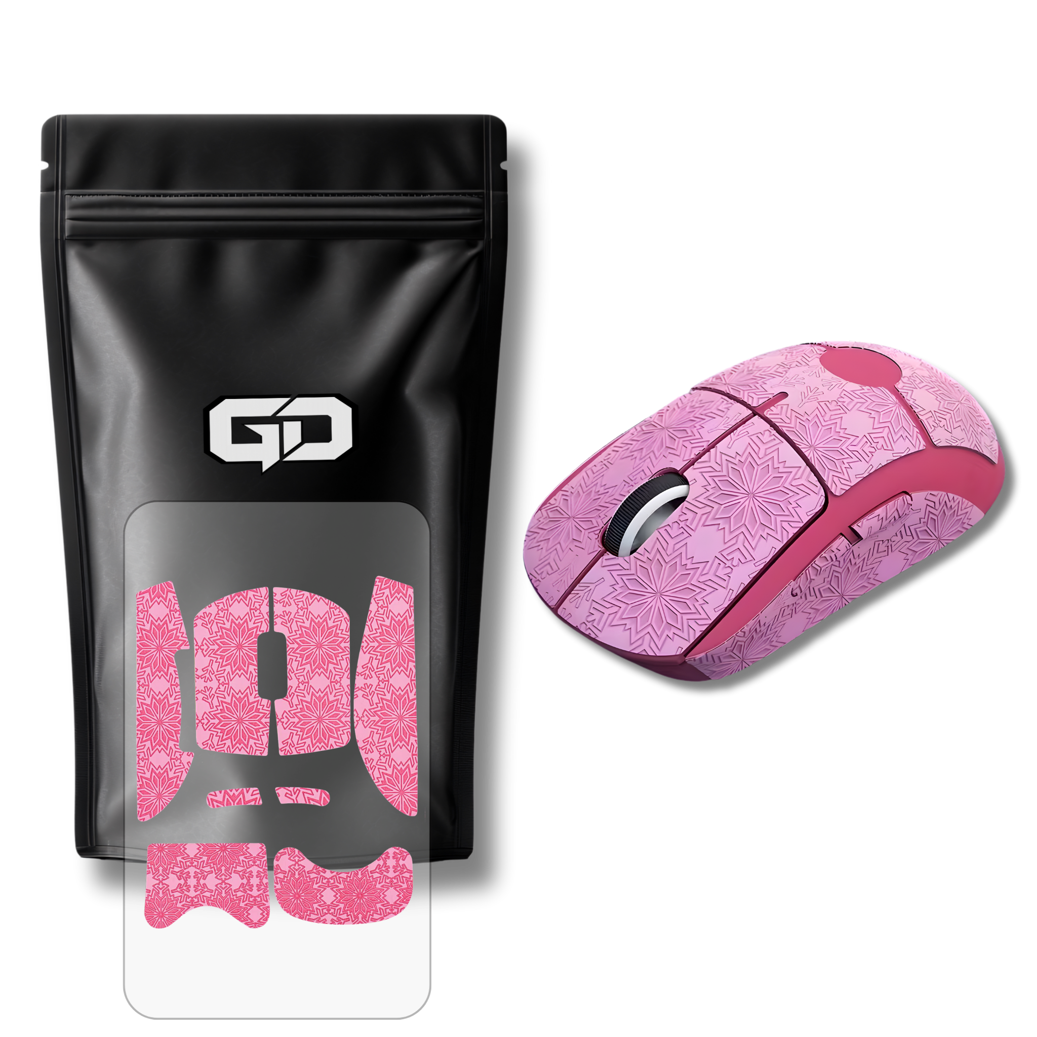 Et sæt grip tape i lyserød farve med et mønster i sneflager monteret på en Logitech G Pro X Superlight 2 DEX gaming mus vist ovenfra ved siden af produktemballage fra GamingDeals med et fritliggende sæt grip tapes af samme type