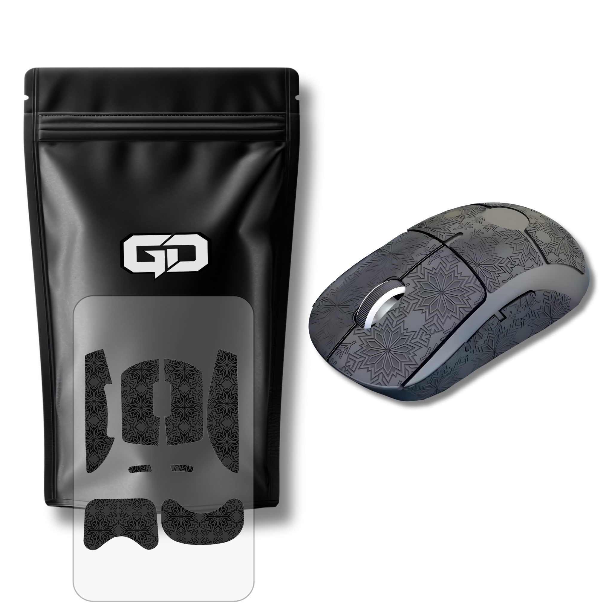 Et sæt grip tape i sort farve med et mønster i sneflager monteret på en Logitech G Pro X Superlight gaming mus vist ovenfra ved siden af produktemballage fra GamingDeals med et fritliggende sæt grip tapes af samme type